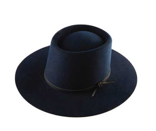 A swanky outfit, complete with a city hat to match