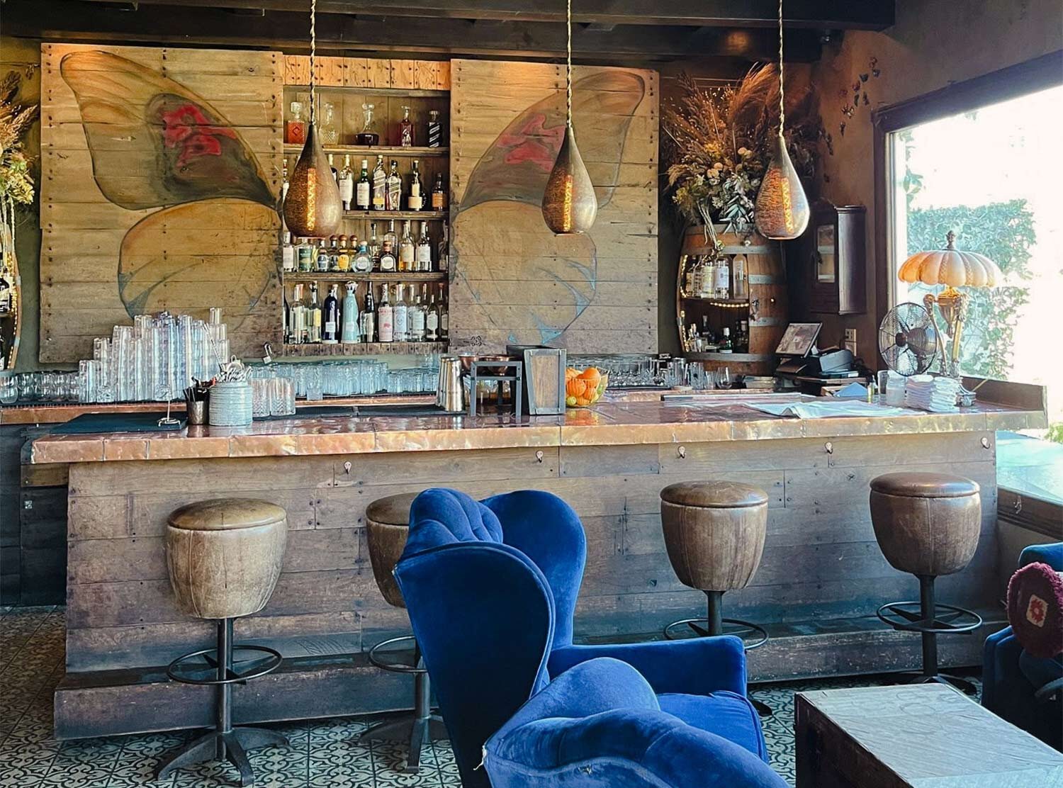 Petit Ermitage The wooden bar on the rooftop